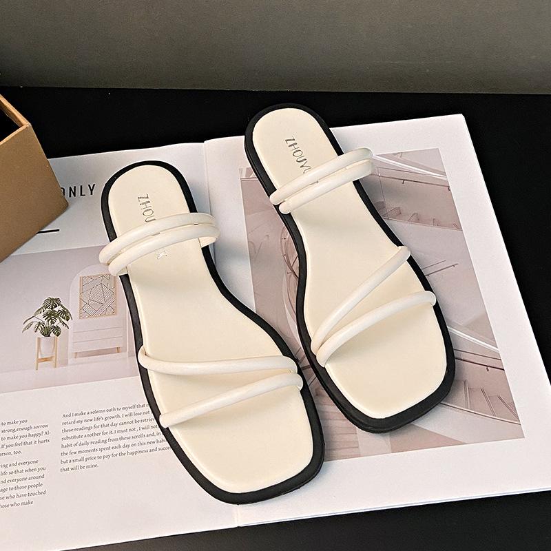 

Французский вечерний бриз однословные тапочки женские летние 2025 новые корейская версия фея ретро ремешок плоские сандалии 35 бежевый