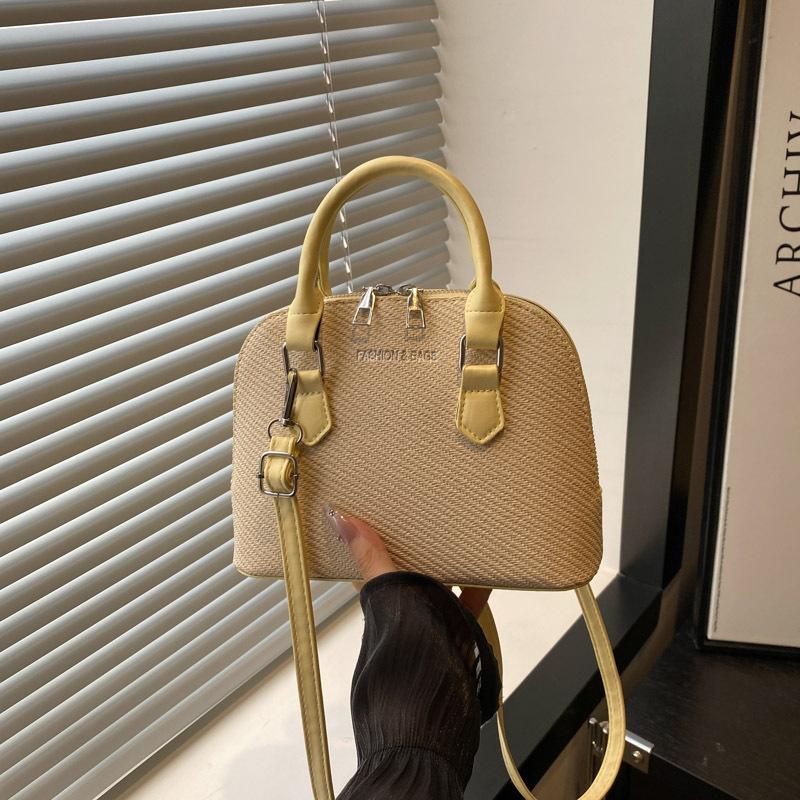 

Summer new high-end texture temperament portable shell bag temperament atmospheric versatile shoulder messenger bag жовтий