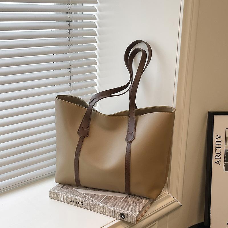 

Вместительная ретро нишевая сумка-тоут с высоким чувством стиля, простая, для通勤, универсальная, модная, на одно плечо, для работы