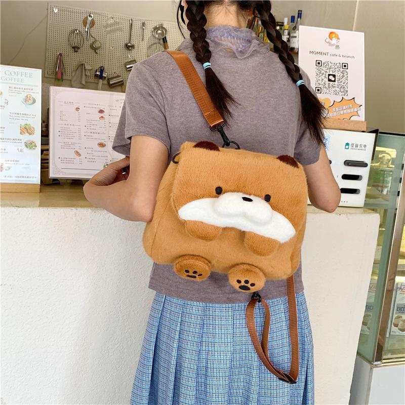 Trend creative super cute sea otter flip backpack sweet girl cartoon fun tide play doll messenger bag