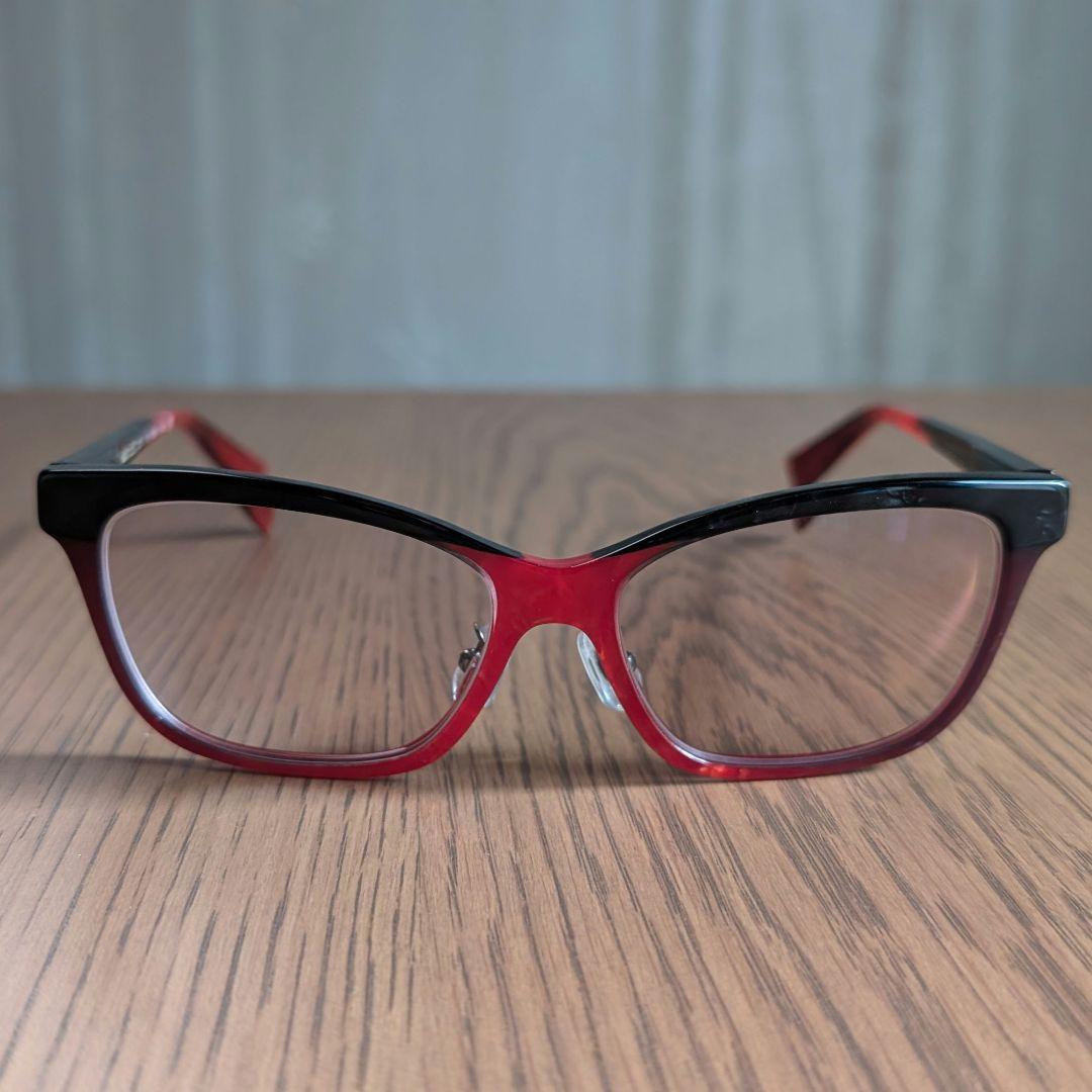 Used Made in Italy Red Marble pattern Moderate cat s eye glasses