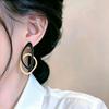 Trendige Geometrische Kreis-Steckohrringe aus Legierung für Damen – Einzigartiges Design, Kreativer Hohl-Ohrschmuck.