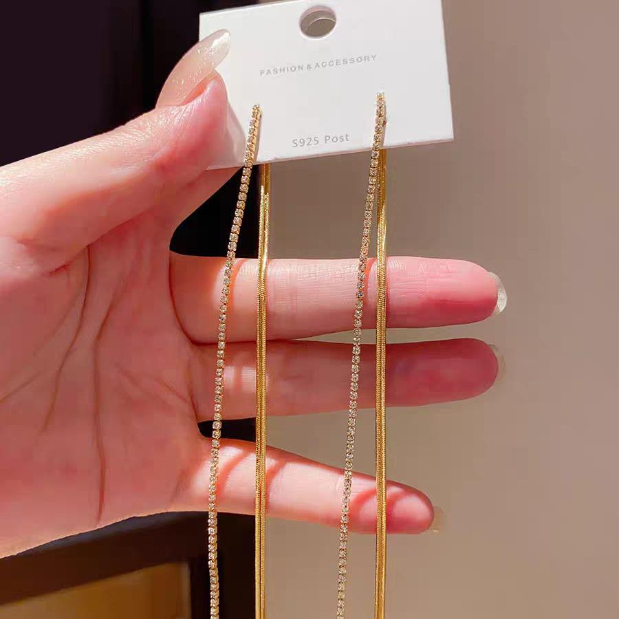 Elegant Retro-Style Snake Bone Chain Tassel Earrings for Women