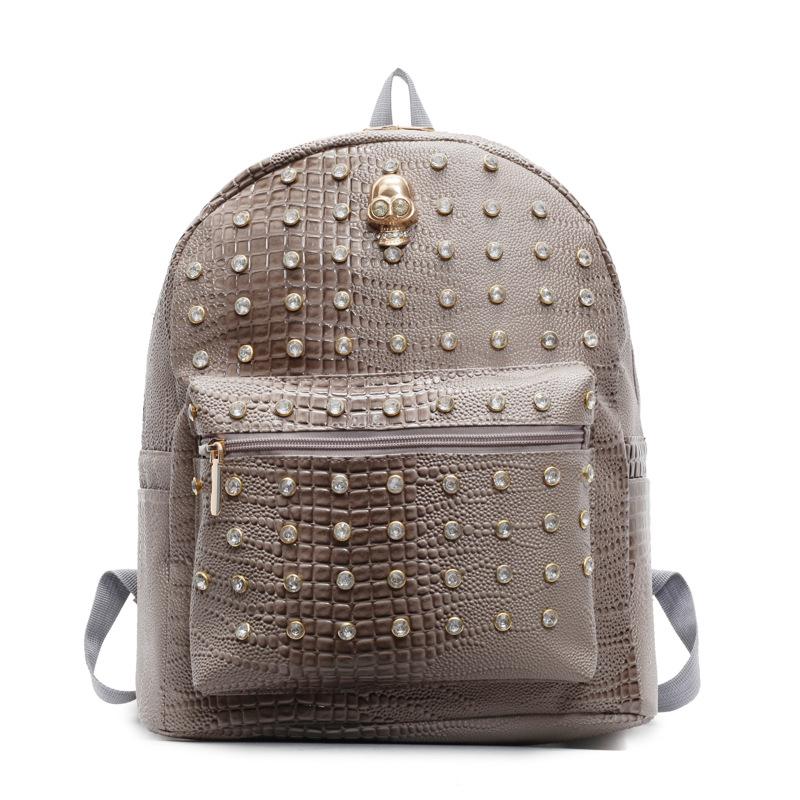 Schoolbag1011 new Korean version fashion rivet soft pu texture solid color backpack casual women's backpack trendy bag