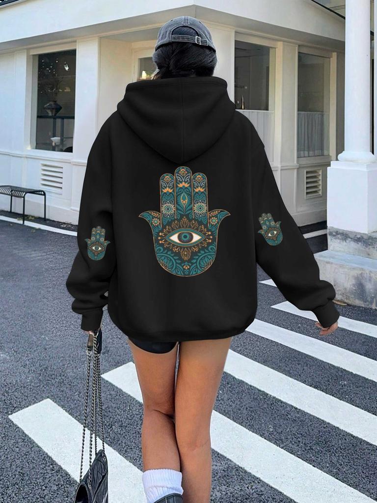 Hamsa hand with eye motif women's hoodies
