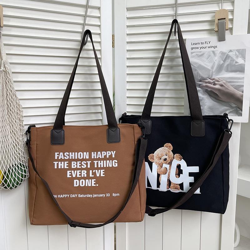 Simple canvas large-capacity bag women's summer new shoulder fashion letter tote bag messenger bag bag