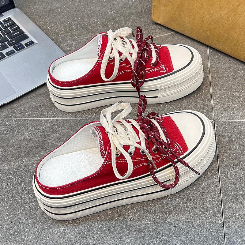Thick-soled bag head with one foot on little white shoes 2025 new small muffin board shoes canvas half slippers women's summer outer wear