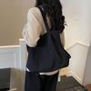 Minimalist Nylon Tote Bag with Spacious Design and Durable Handles Perfect for Everyday Use and Shopping