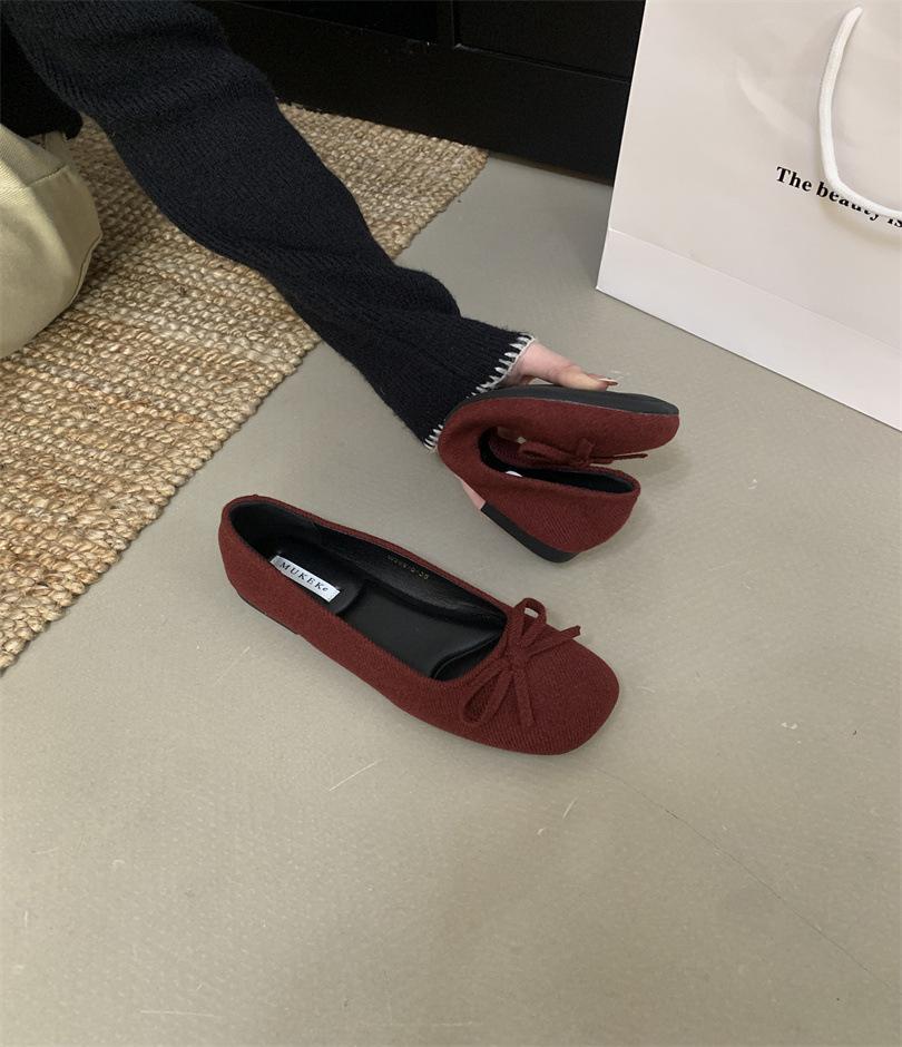 Gentle and cute flat-soled ballet shoes women's shoes 2025 spring evening breeze temperament red with skirt shallow mouth single shoes