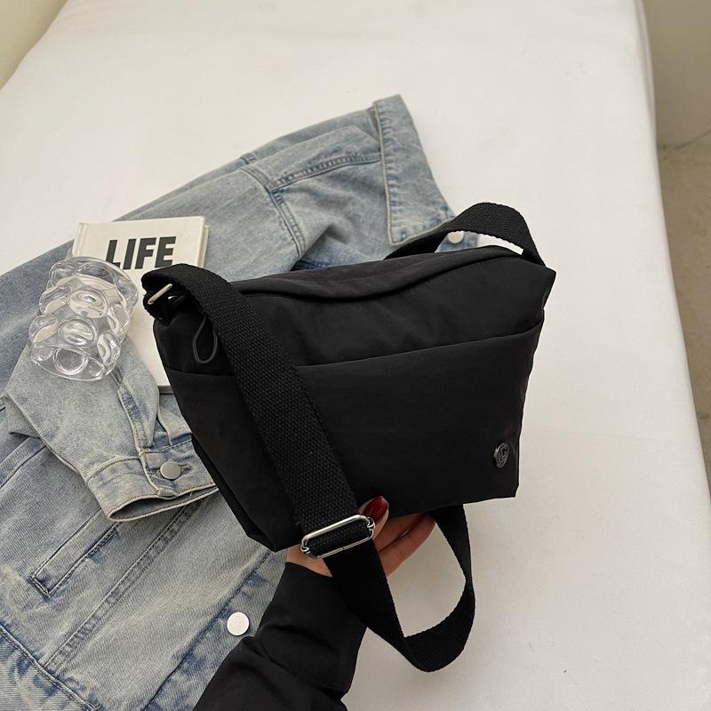 

Crossbody bag women s fashion versatile canvas bag lightweight waterproof dumpling bag walking nylon small backpack men