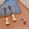 "Boxwood Buddha Guanyin Car Pendant: Creative Rearview Mirror Accessory for Men and Women"