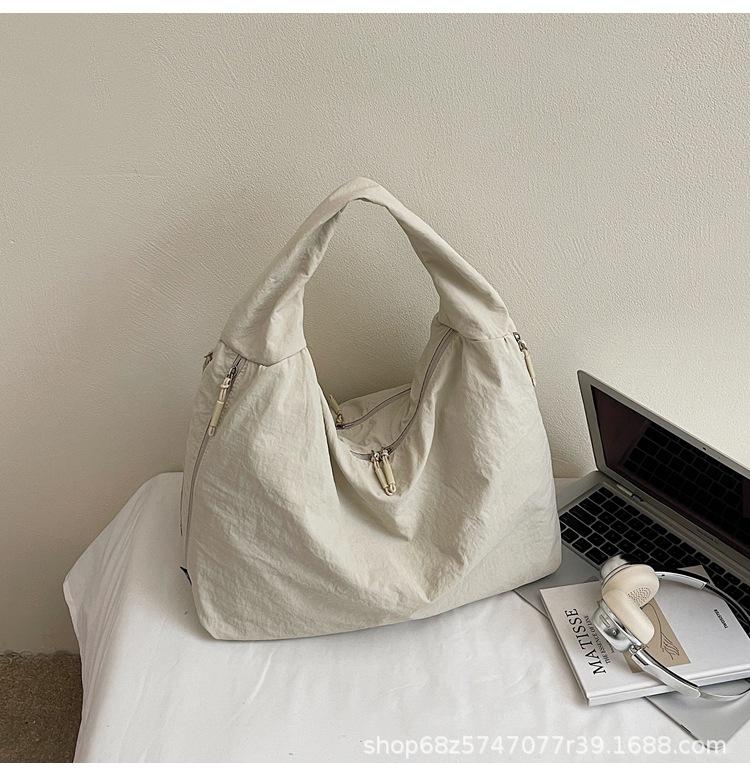 2025 New Large Capacity Versatile Portable Canvas Bag Premium Sense Tote Bag Fashion Commuter Underarm Shoulder Bag Women