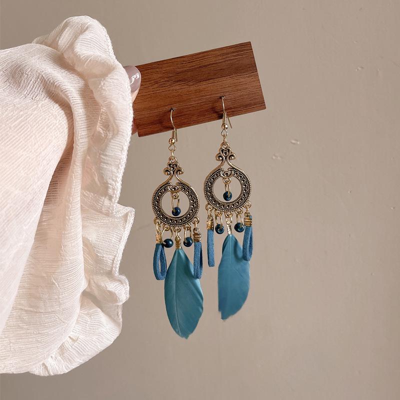 Retro Ethnic Bell Tassel Earrings: Exquisite, Fashionable Dangle Design with Light Luxury Appeal.