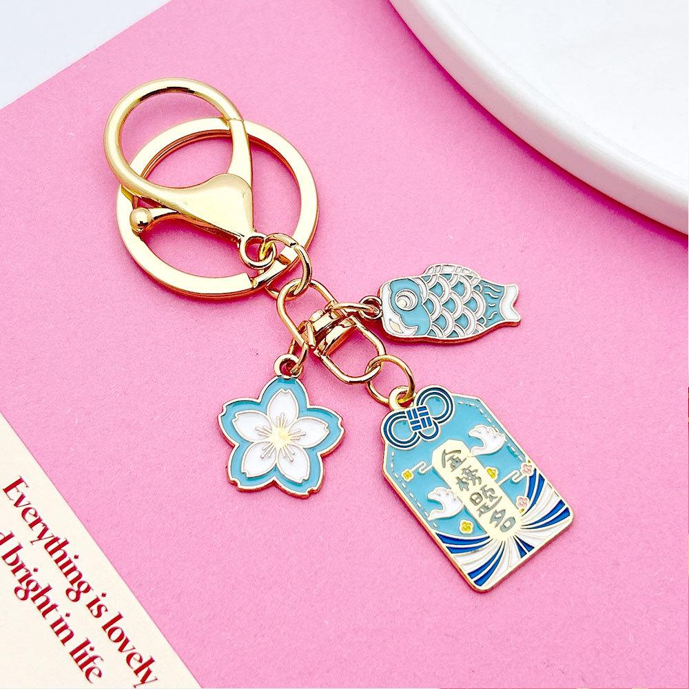 Japanese Sakura Koi Omamori Amulet Keychain for Luck, Wealth & Safety - Charming Couple's Accessory