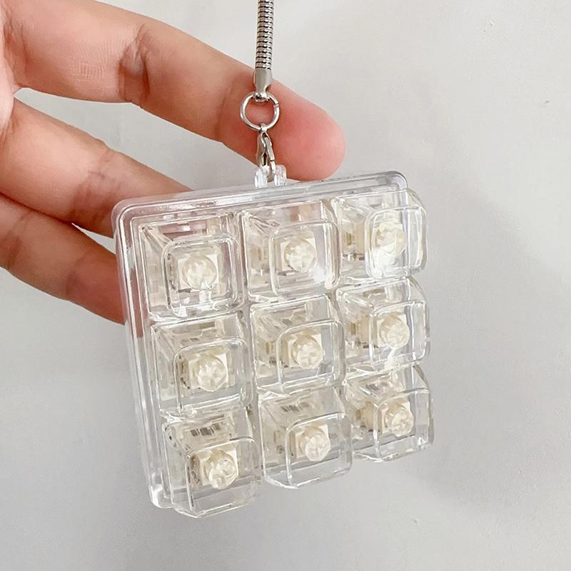 Tastiera a 9 Tasti Keycaps Portachiavi Giocattolo Fidget Keycaps Anti-Ansia Keycaps Festa Sollievo dallo Stress Keycaps Fai-da-Te Tappi Tastiera Giocattolo