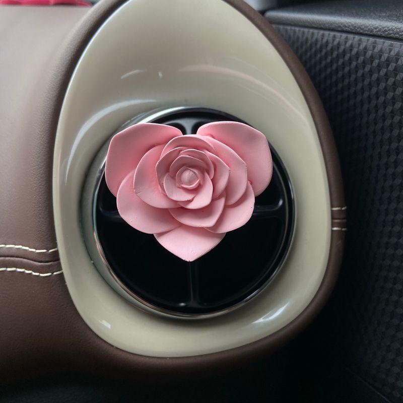 

Creative and Simple Little Man-Shaped Car Fragrance Diffuser, Car Perfume, Car Air Conditioning Vent Aroma Stone, Car Interior Decoration Ornament Pink Love Rose (Free Essential Oil)