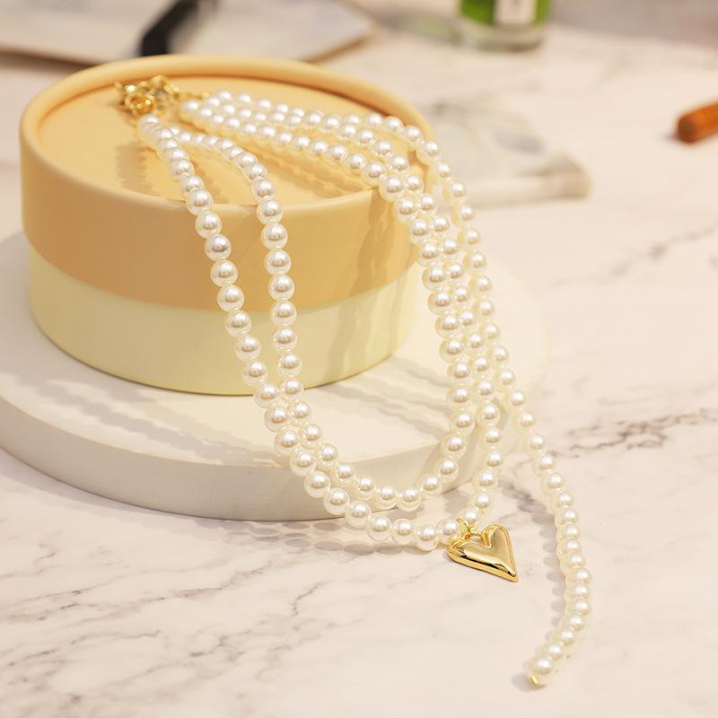 

Japanese and Korean style new double-layer pearl necklace personalized fashion necklace trendy brand necklace women s love pendant золотий