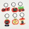 Christmas Black Cat Apple Plush Keychain: Cartoon Accessory for Backpack or Jewelry.