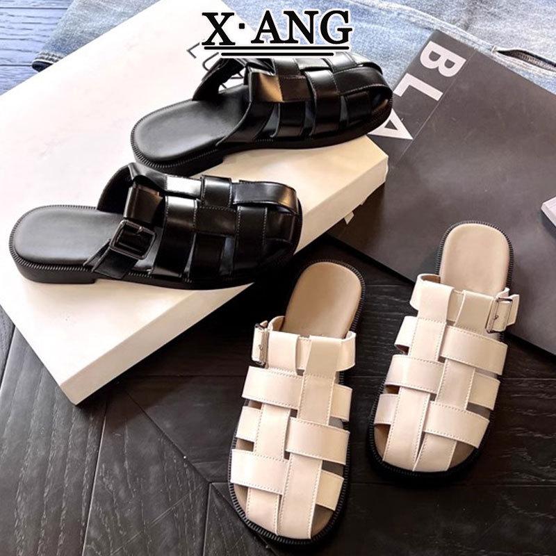 Cowhide version soft-soled bag head half slippers women's summer wear 2025 new woven hollow pig cage shoes Roman sandals women