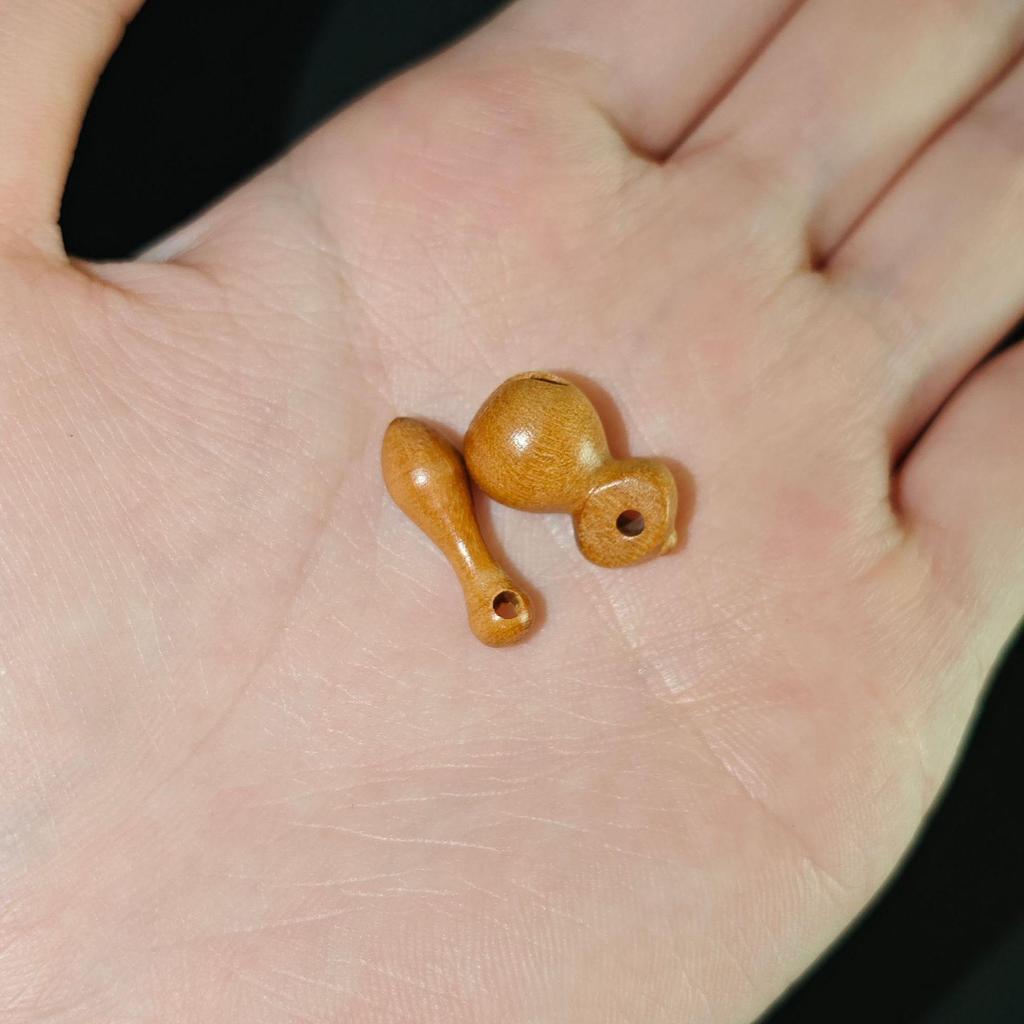 Mindful Peach Wood Fish Beads Bracelet with Carved Wooden Pendant