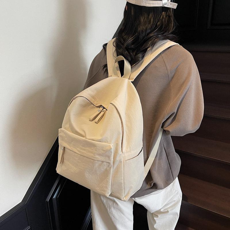 

New nylon light casual schoolbag Japanese and Korean solid color simple daily commuting backpack