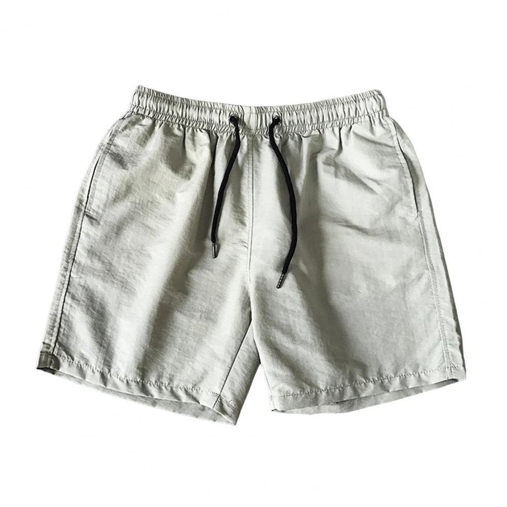 Letnie męskie stroje kąpielowe plażowe spodenki jednokolorowe z elastycznym pasem szybkoschnące oddychające spodenki kąpielowe spodnie kąpielowe