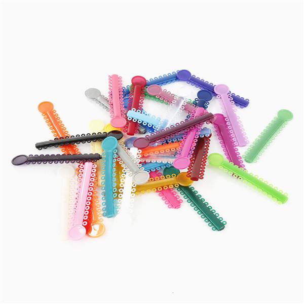 Kieferorthopädische Ligaturbinder, zahnärztliche, elastische Ligaturbinder, elastische O-Ringe, Zahnspangen, Gummibänder