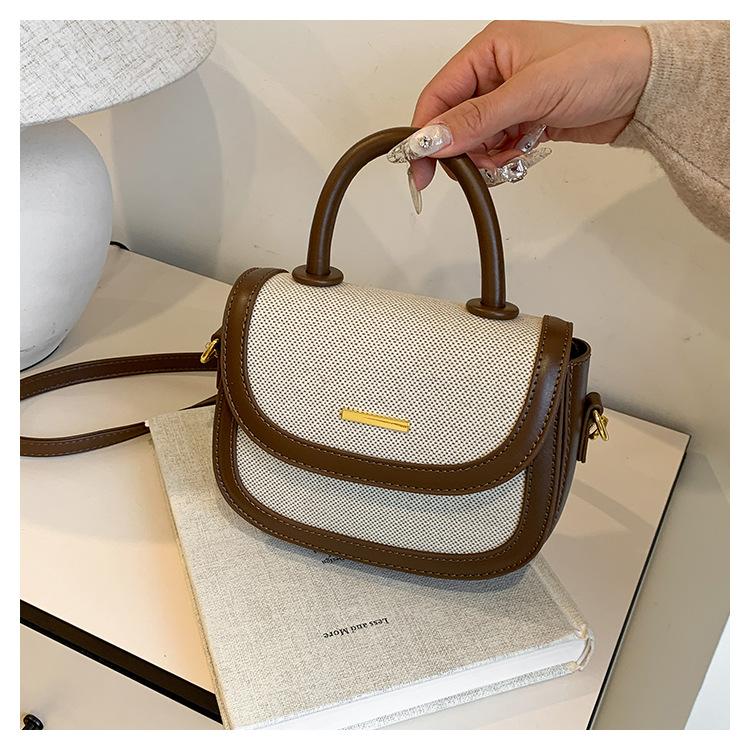 Borsa a sella portatile con texture premium da donna, nuova borsa a tracolla messenger retrò alla moda con inserti a contrasto di colore
