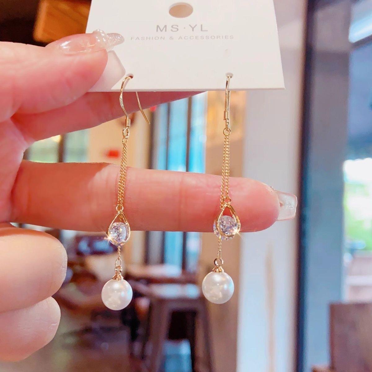 Elegant French Water Drop Tassel Earrings - Stylish, Long, Beaded Design for a Light Luxury Fashion Statement.