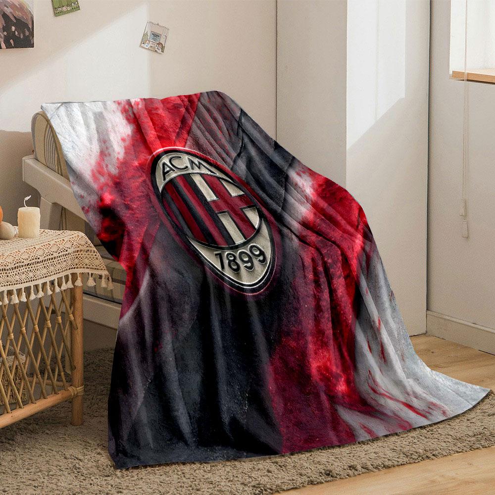 Red and black textured diagonal streaks with a central oval emblem. for all seasons blanket lunch break throw gift