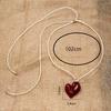 Niche design special-shaped love pendant, leather rope necklace, long adjustable sweater chain, sweet and cool accessories.