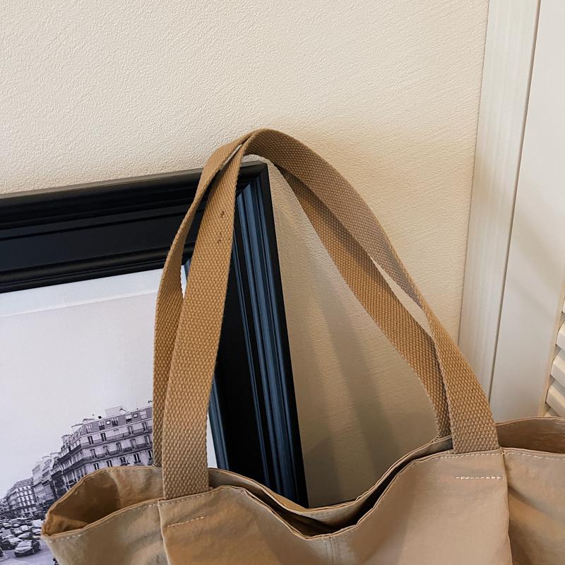 Minimalist Nylon Tote Bag with Spacious Design and Durable Handles Perfect for Everyday Use and Shopping