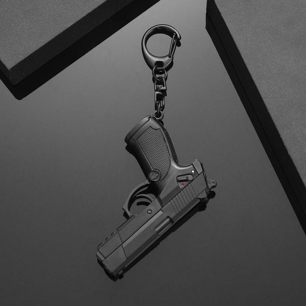 Portachiavi Giocattolo Pistola Decorativo Novità: Ciondolo Staccabile e Realistico