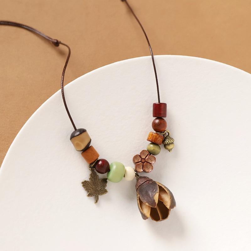 Retro literary necklace, natural plant fruit acorn pendant, long sweater chain, niche accessories