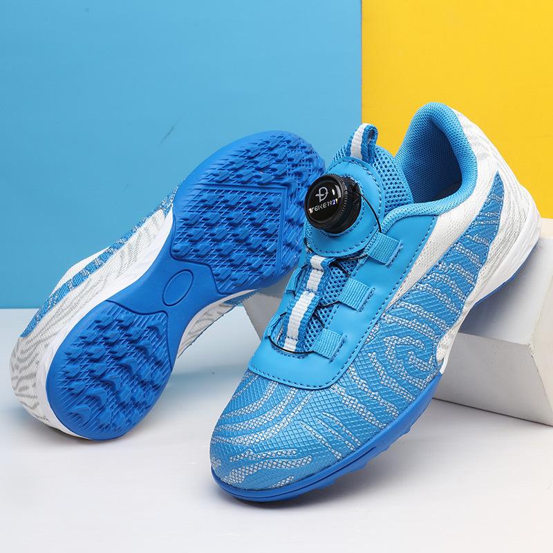 Elementary school students smash training nails low price spinning sneakers men's buttons World Cup football shoes girls