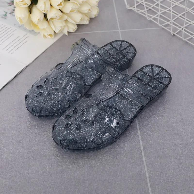 Dámské ležérní T-páskové křišťálové želé sandály Letní uzavřená kulatá špička Kotníkový pásek Plážové boty Průhledné třpytivé ploché pantofle pro ženy Nazouvací pantofle