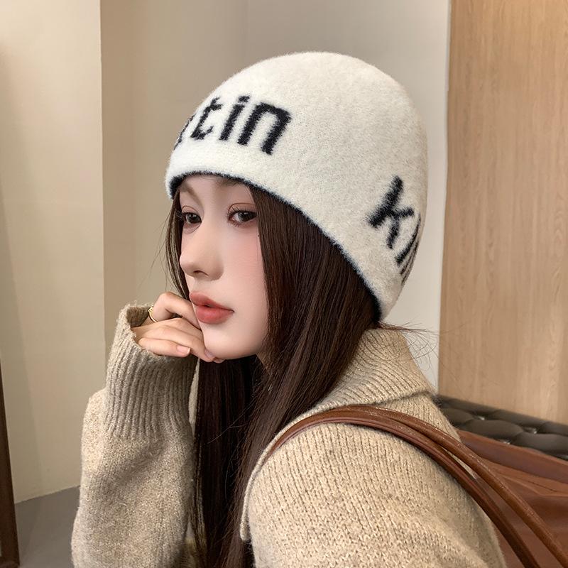 Autumn and winter outdoor mountaineering warm ear protection niche letter knitted hat women