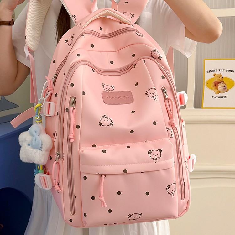 Schoolbag wholesale new middle and high school school bag backpack Japanese versatile casual fashion doll pendant large capacity backpack
