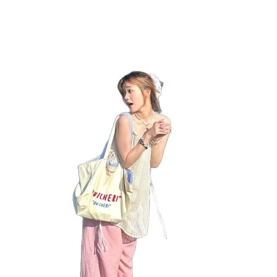 Niche design alphabet canvas bag women's 2025 new retro versatile large-capacity shoulder tote bag