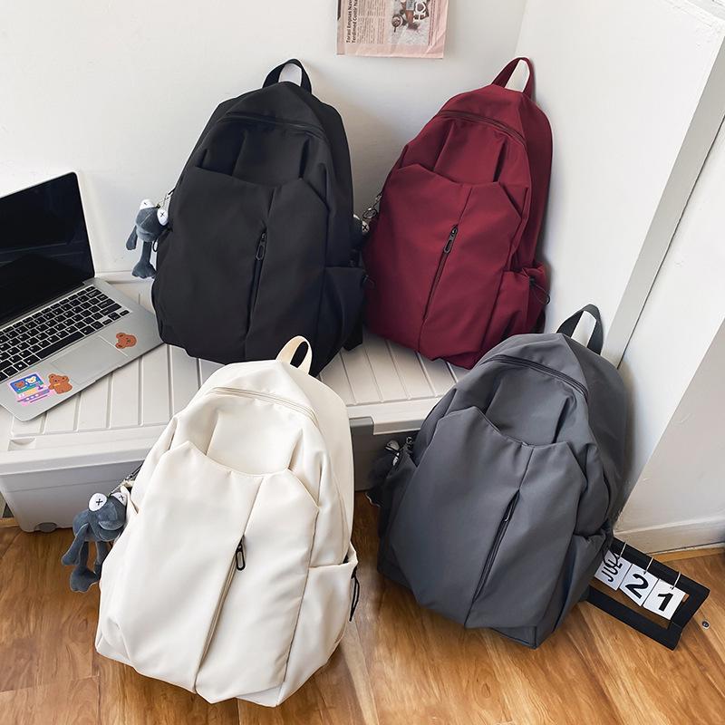 Pánský lehký módní batoh s velkou kapacitou pro vysokoškolské a středoškolské studenty