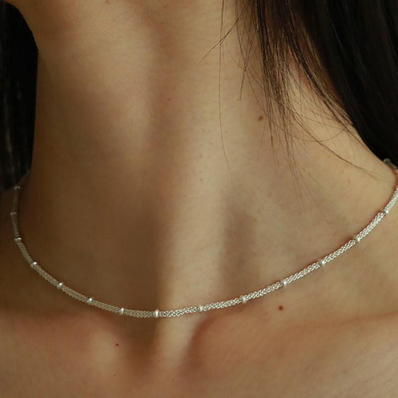 

Less is more silver three-line necklace free