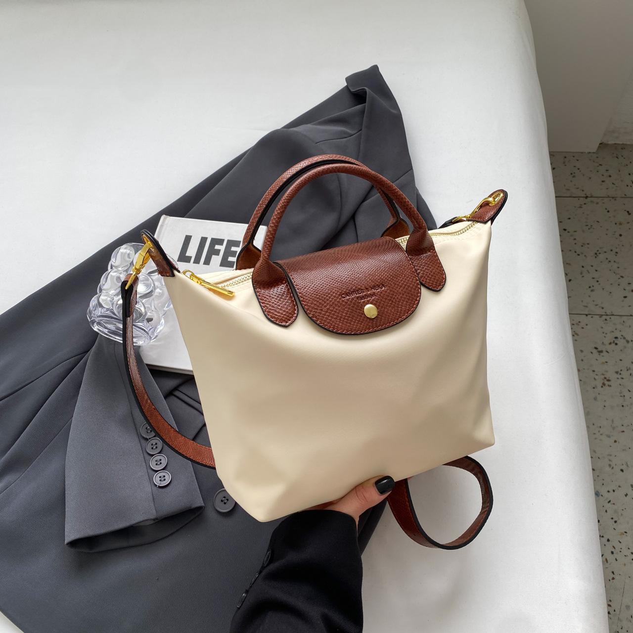 

2025 new Oxford cloth bag, dragon bags, female texture fashion splicing dumpling bag, simple handbag