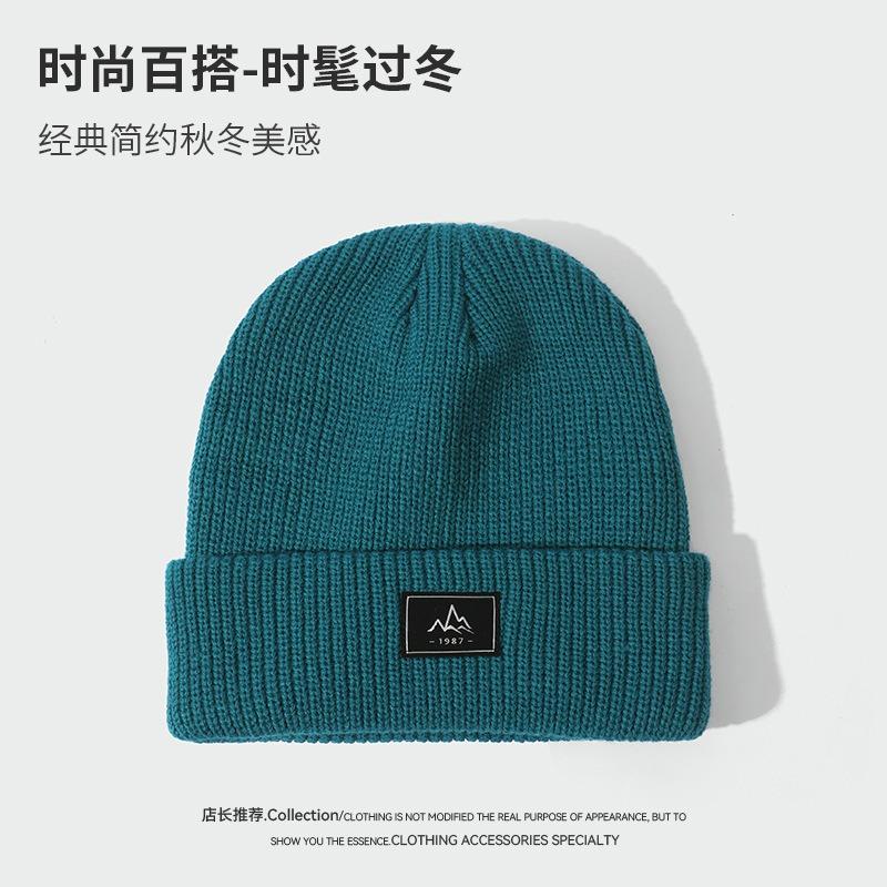 

Mountain silver label cloth knitted hat women s autumn and winter outdoor hat mountaineering cold protection ear protection men s wool hat Average Size (54-58cm)