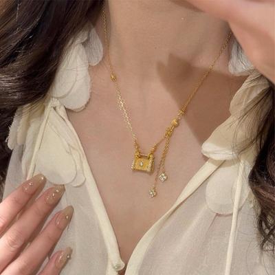 Medieval Brushed Zircon Lock Bag Four-leaf Clover Necklace Light Luxury Fringed Collarbone Chain Niche Neck Chain