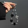 New high-end autumn and winter pom-pom mobile phone chain beaded short lanyard bag keychain pendant girl pendant