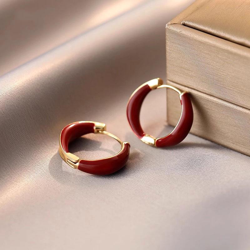 Zhou Yutong Red Drip Glaze Earrings: High-End, Niche Design, Light Luxury, Perfect for Autumn/Winter.