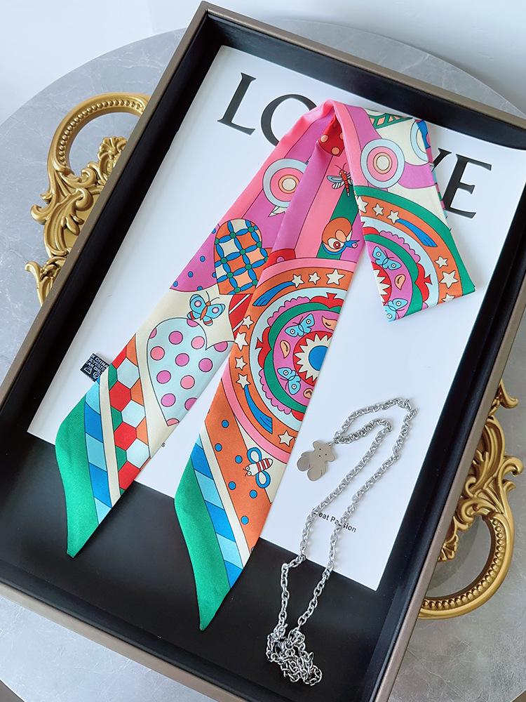 Ozdoba uchwytu torebki w postaci wstążki