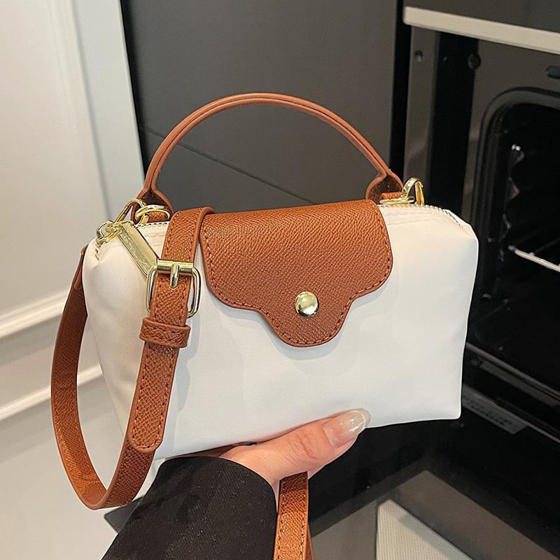 Wholesale new products niche simple contrasting color portable small bag women's leisure trendy versatile light splicing messenger change bag