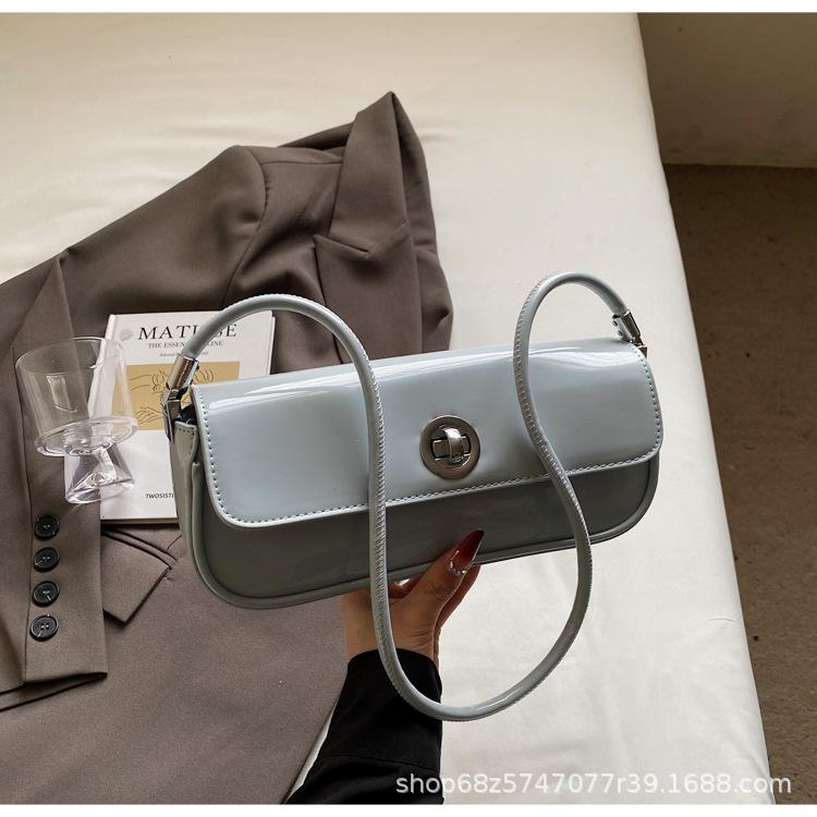 

Simple retro light luxury underarm bag women s 2025 spring popular solid color versatile baguette bag premium shoulder bag синий