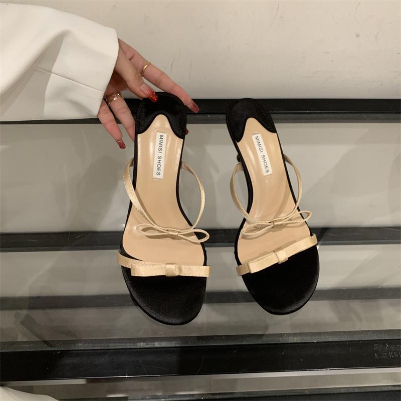 2025 spring and summer Korean version of round head bow temperament high heels light luxury thin heels Internet celebrity fashion one word cool slipp